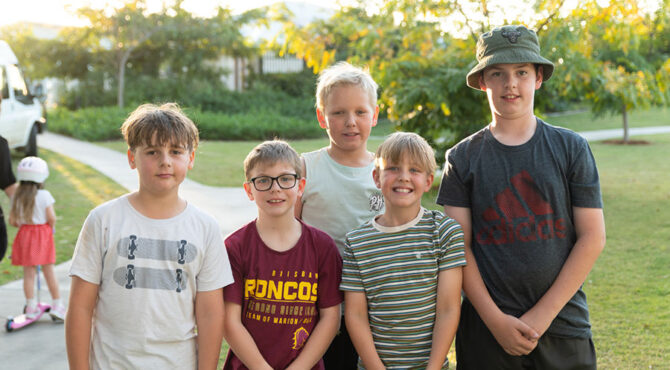 neighbourhood friends standing together pulling a funny face in rockhampton